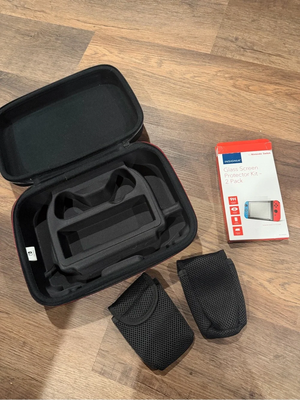 Nintendo Switch Black Carrying Case with Red Accents & accessories
